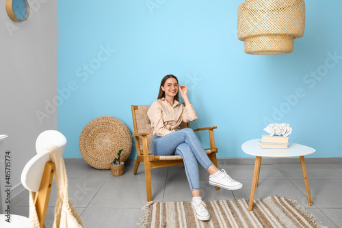 Young woman with eyeglasses...