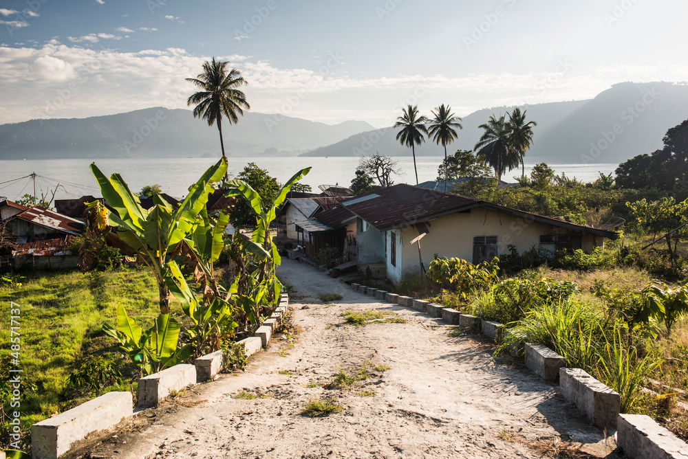 Small village on the banks of Lake Toba (Danau Toba), the largest volcanic lake in the world, North Sumatra, Indonesia, Asia