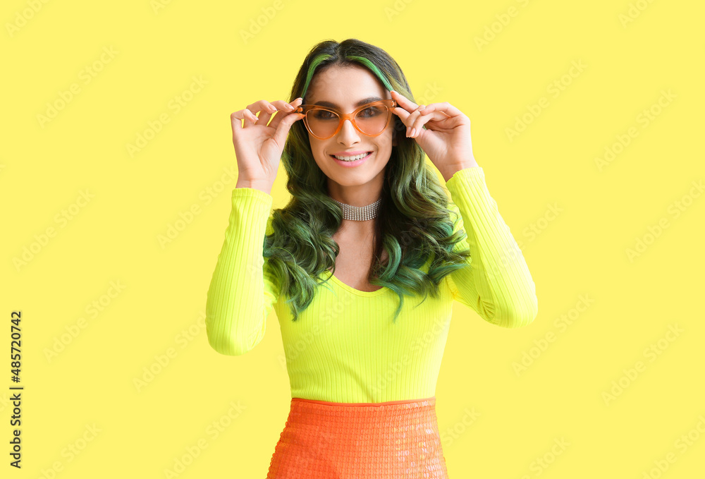 Beautiful young woman with unusual green hair on color background Beautiful young woman with unusual green hair on color background