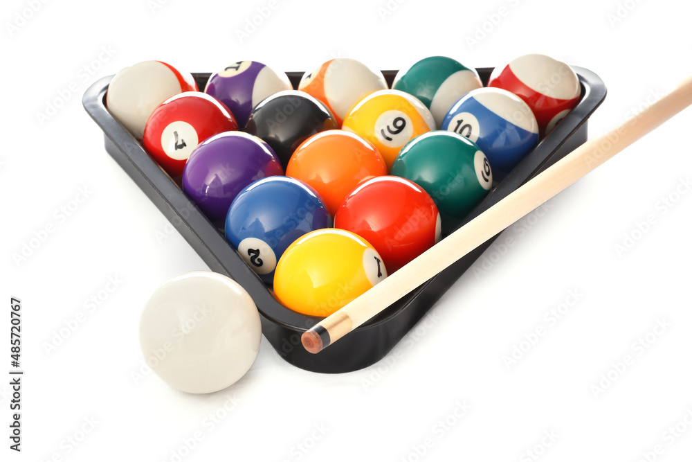 Naklejka premium Rack with billiard balls and cue on white background