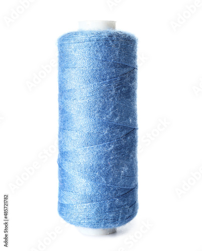 Bright sewing thread spool on white background