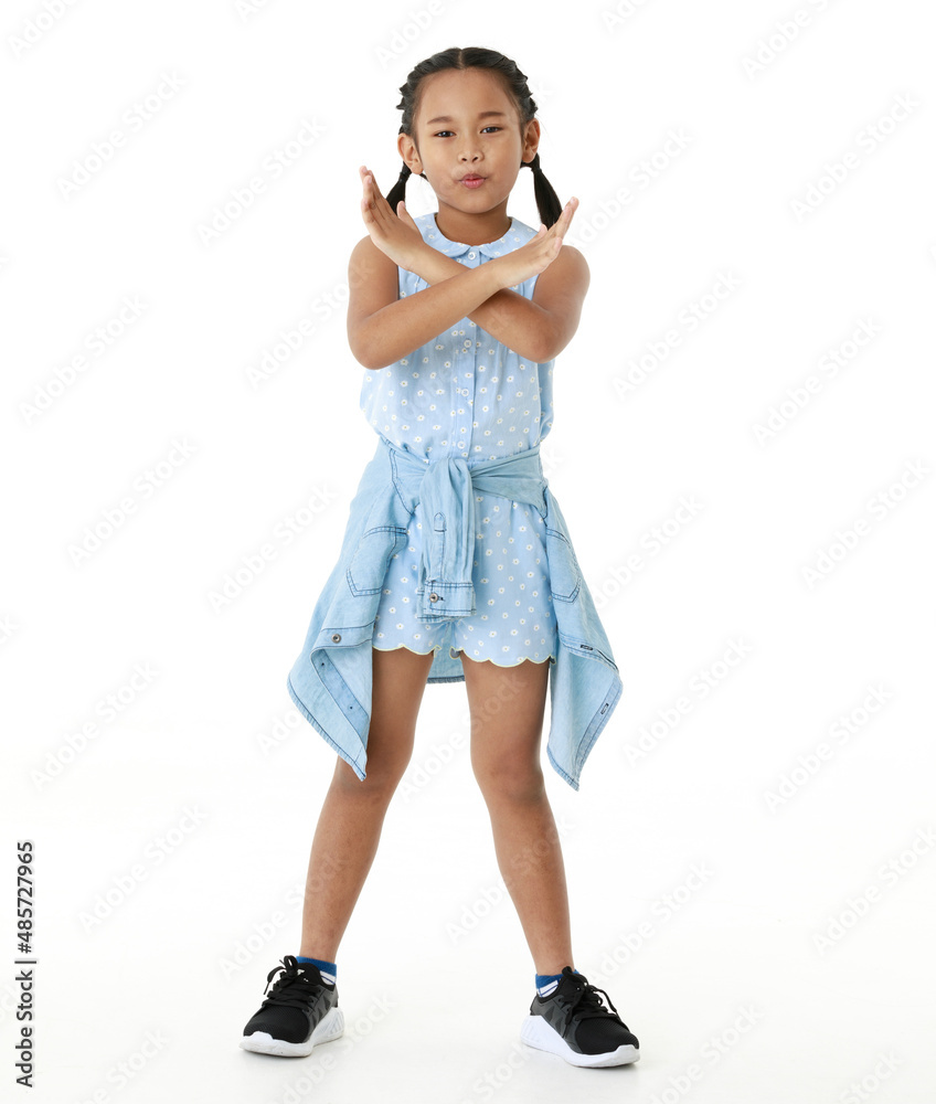 Portrait full body studio cutout shot of Asian young happy cheerful pigtail braid hairstyle elementary school girl in blue sleeveless dress standing posing smiling look at camera on white background Portrait full body studio cutout shot of Asian young happy cheerful pigtail braid hairstyle elementary school girl in blue sleeveless dress standing posing smiling look at camera on white background