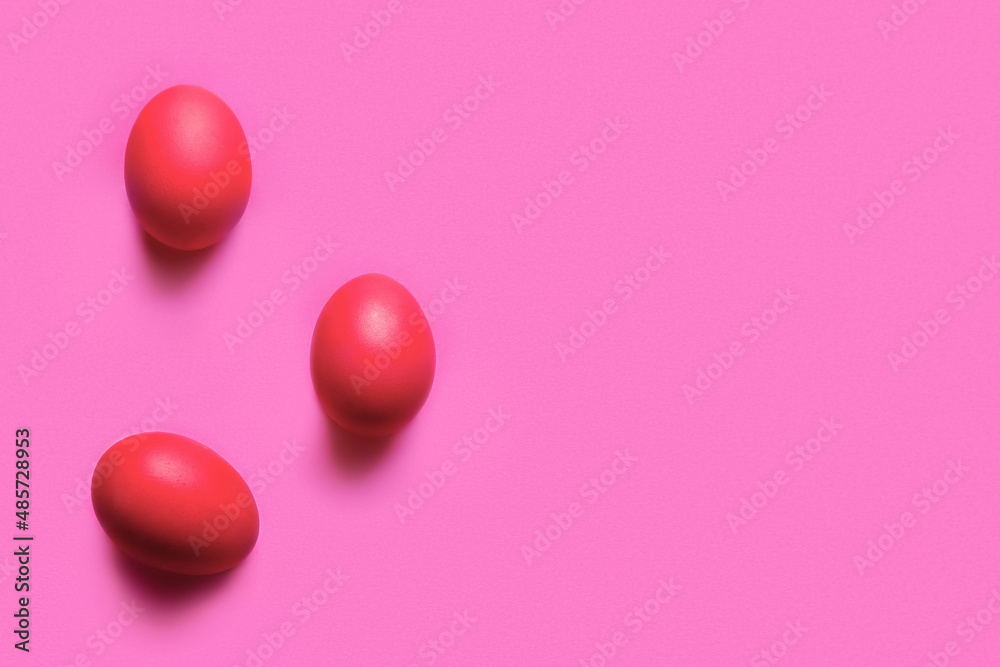 Red painted Easter eggs on color background Red painted Easter eggs on color background