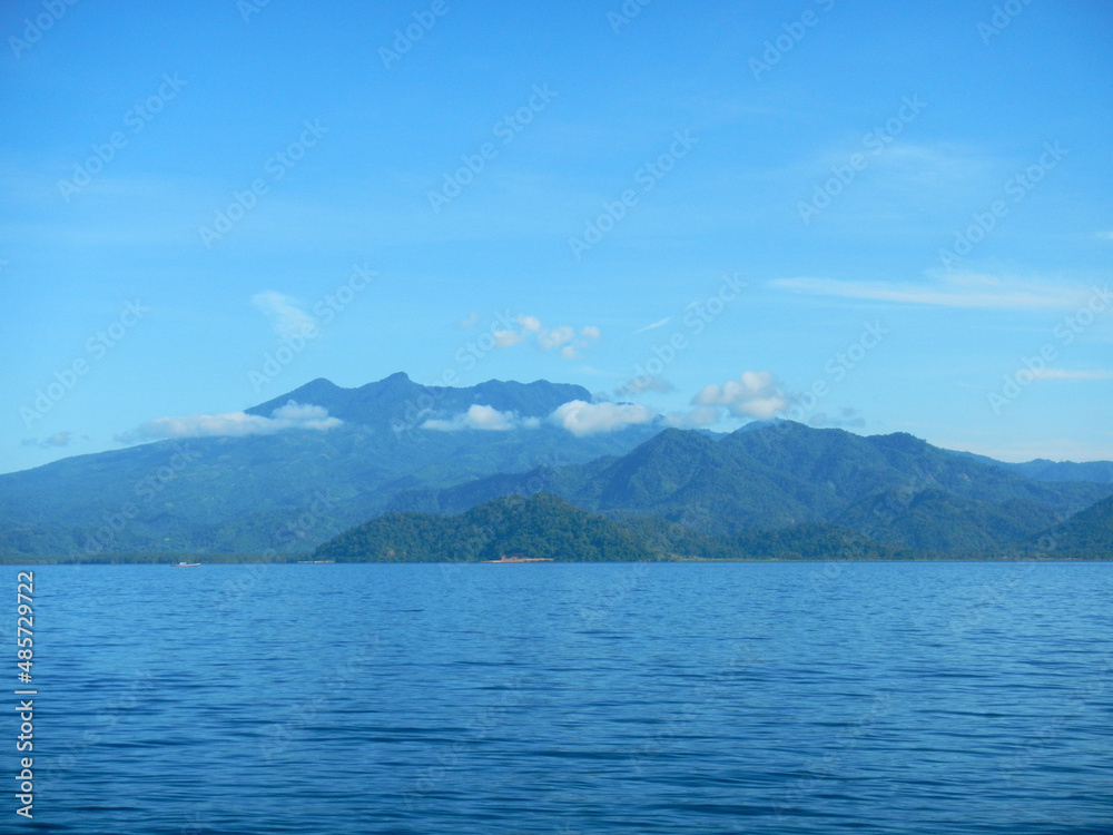 Blue sea and island in Indonesia with blue sky