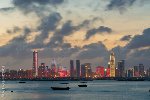 Skyline of Shenzhen city, China under sunset. Viewed from Hong Kong border Lau Fau Shan