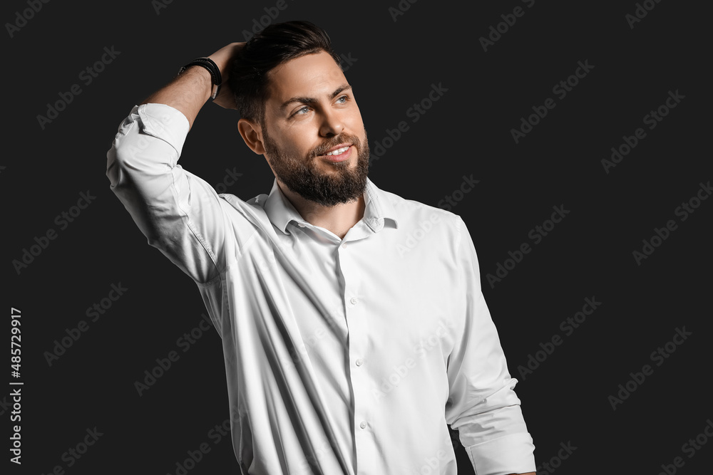 Obraz premium Stylish bearded man on dark background