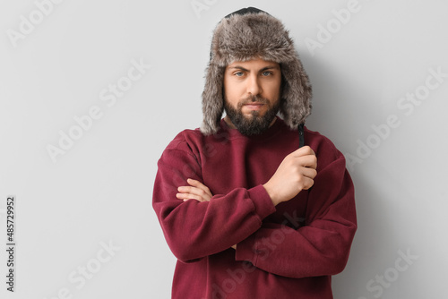 Stylish bearded man in swea...