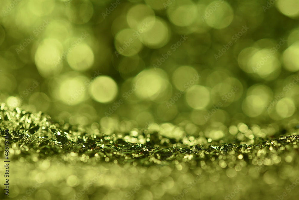 Obraz premium Green glitter lights texture. Abstract christmas background.