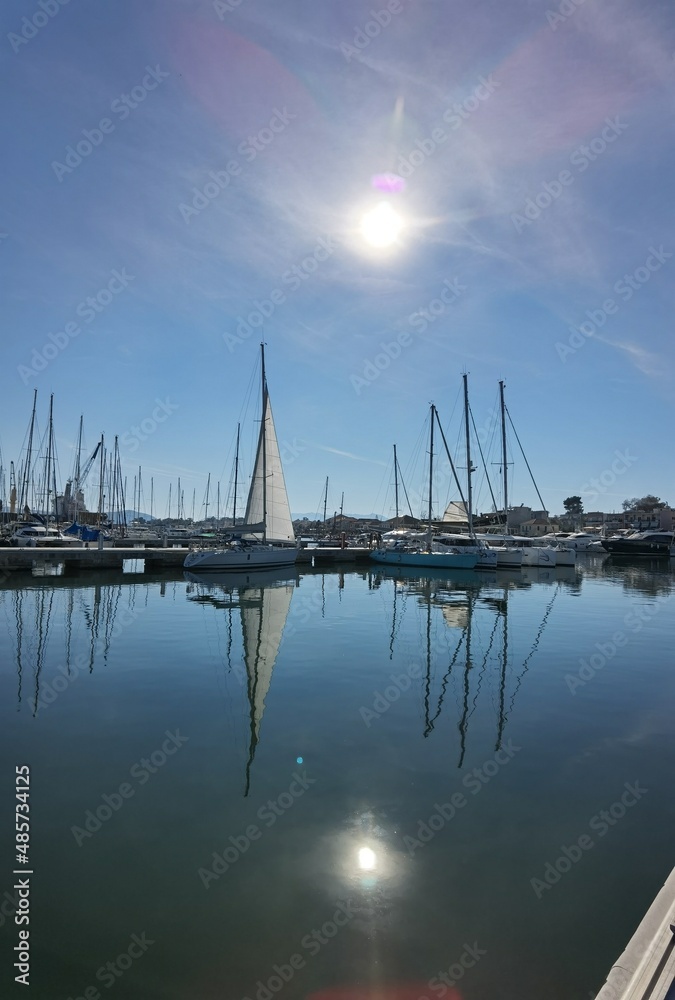 preveza city new port yatches boats ships in lbue sea and sunny winter day in greece preveza city new port yatches boats ships in lbue sea and sunny winter day in greece