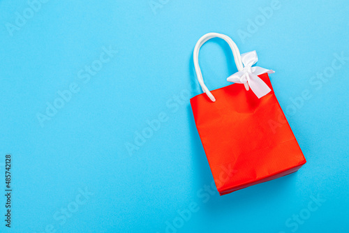 eco Paper shopping bag on blue background. Logo layout. mock up recycling