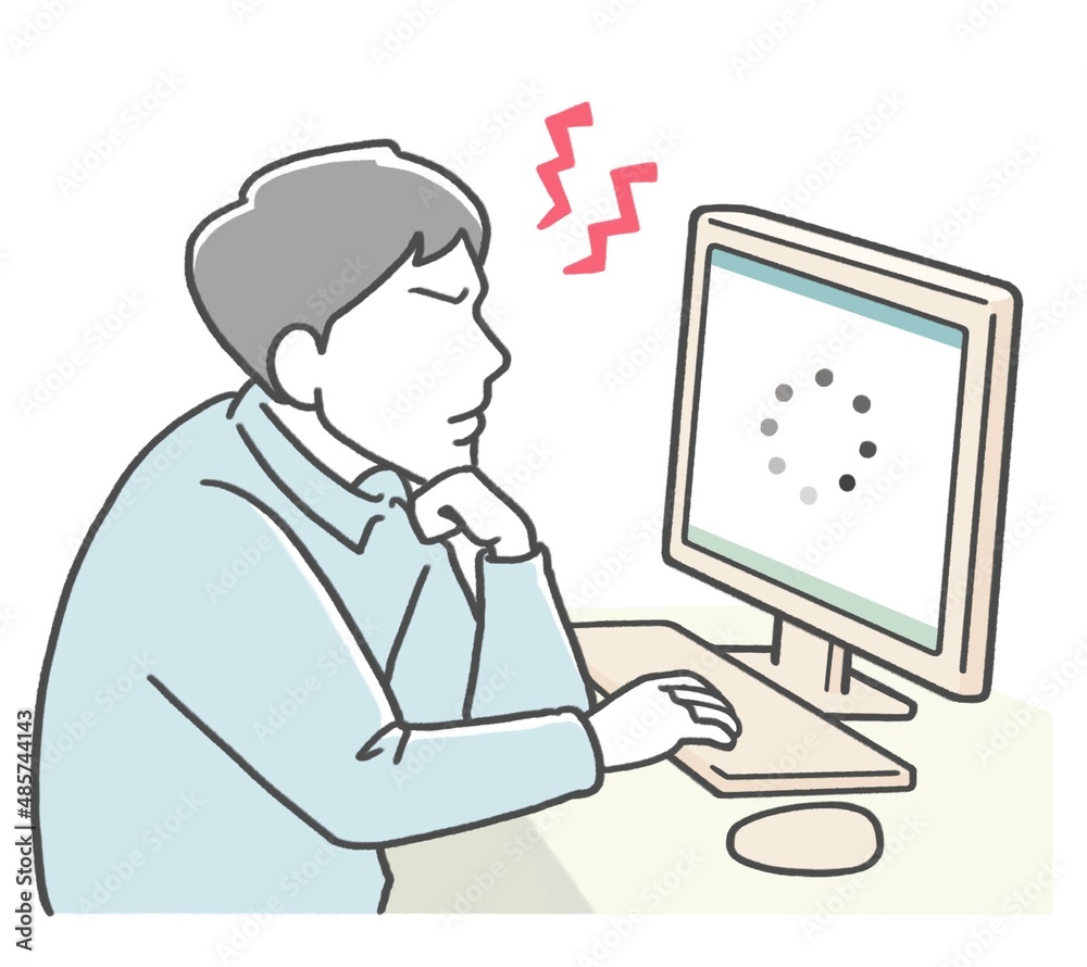 インターネットの読み込みが遅いのでイライラしている男性 インターネットの読み込みが遅いのでイライラしている男性