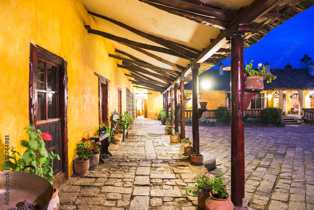 Fototapeta premium Courtyard at the Inca Hacienda San Agustin de Callo, luxury boutique hotel near Cotopaxi National Park, Ecuador, South America