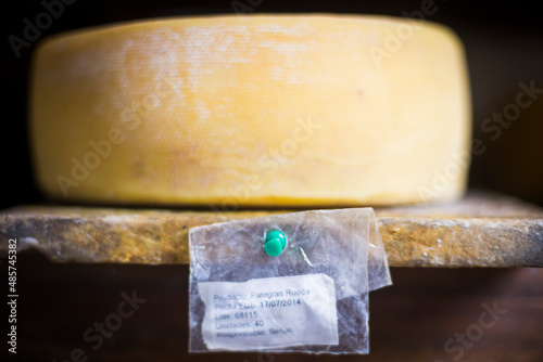 Cheese maturing in the cheese factory on the farm at Hacienda Zuleta, Imbabura, Ecuador, South America photo