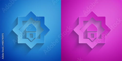 Paper cut Muslim Mosque icon isolated on blue and purple background. Paper art style. Vector