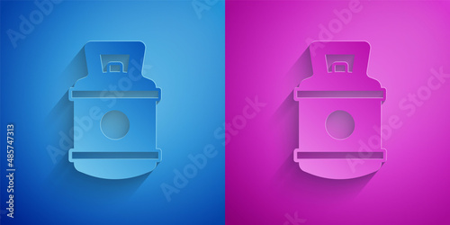 Paper cut Propane gas tank icon isolated on blue and purple background. Flammable gas tank icon. Paper art style. Vector