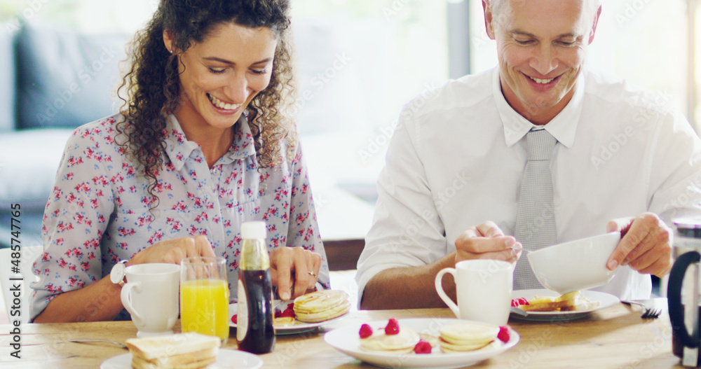 Where successful days are made, at the breakfast table. Shot of a happy middle aged couple having breakfast together in the morning at home. Where successful days are made, at the breakfast table. Shot of a happy middle aged couple having breakfast together in the morning at home.