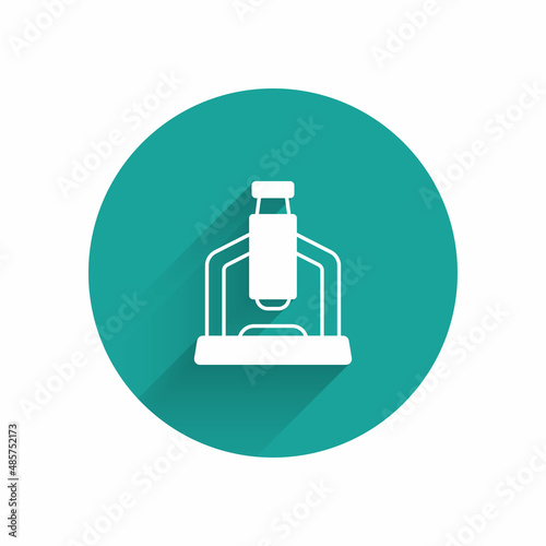 White Microscope icon isolated with long shadow background. Chemistry, pharmaceutical instrument, microbiology magnifying tool. Green circle button. Vector