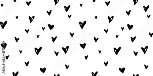 Vector Seamless abstract pattern of small hearts. Hand drawn doodle background, texture for textile, wrapping paper, Valentines day.