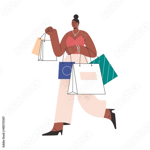 Black woman holding many shopping bags with fashion clothes. Happy customer going, carrying purchases. Shopper walking with packs in hands. Flat vector illustration isolated on white background