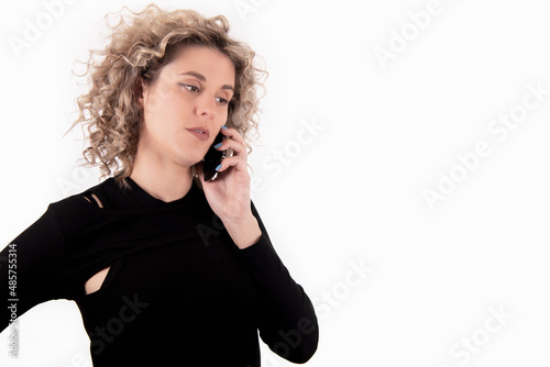 Beautiful woman listening to her smartphone