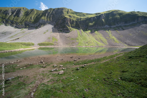 landscape in switzerland at the eisee 1900m. The lake is of natural origin near the Brienzer Rothorn. photo