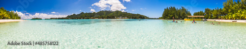 Muri Beach and Motu Taakoka Island in Muri Lagoon, Rarotonga, Cook Islands, background with copy space photo