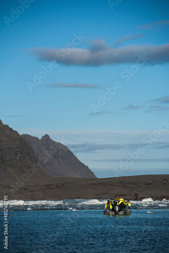 Zodiac boat tour of Jokulsarlon Glacier Lagoon, a glacial lake filled with icebergs in South East Iceland, Europe photo