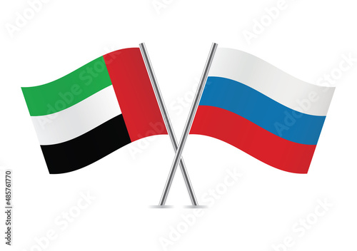 The United Arab Emirates and Russia crossed flags. UAE and Russian flags isolated on white background. Vector illustration.