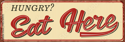 Vintage Eat Here metal sign.	
