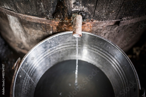 Distillery for making Palinka, a traditional Romanian fuit brandy, Sarbi, Maramures, Romania photo