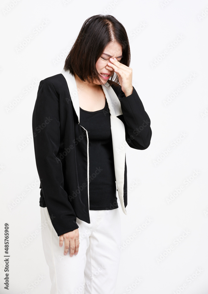 Portrait studio isolated cutout closeup shot of Asian young angry stressed depressed female businesswoman in formal wears with optical eyeglasses standing holding hands on head on white background Portrait studio isolated cutout closeup shot of Asian young angry stressed depressed female businesswoman in formal wears with optical eyeglasses standing holding hands on head on white background
