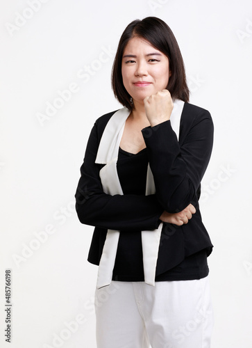 Portrait studio isolated cutout closeup shot Asian young successful professional female businesswoman entrepreneur in formal suit with eyeglasses standing smiling look at camera on white background