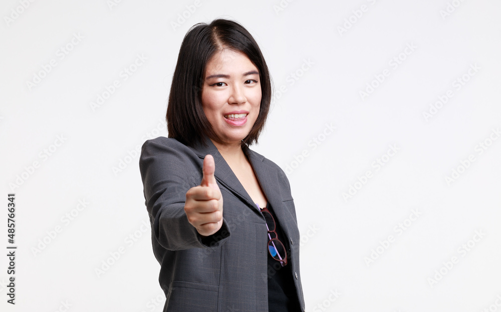Portrait studio isolated cutout closeup shot Asian young successful professional female businesswoman entrepreneur in formal suit with eyeglasses standing smiling look at camera on white background Portrait studio isolated cutout closeup shot Asian young successful professional female businesswoman entrepreneur in formal suit with eyeglasses standing smiling look at camera on white background