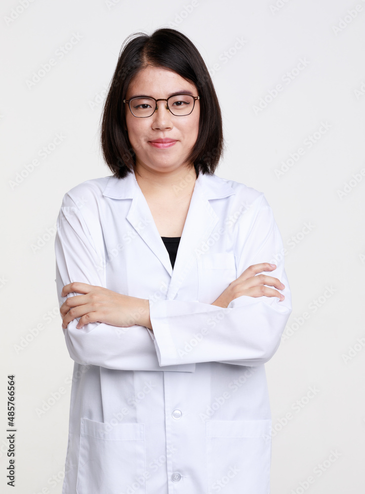 Portrait studio isolated cutout closeup shot of Asian professional successful female doctor in lab coat with stethoscope smiling look at camera on white background Portrait studio isolated cutout closeup shot of Asian professional successful female doctor in lab coat with stethoscope smiling look at camera on white background