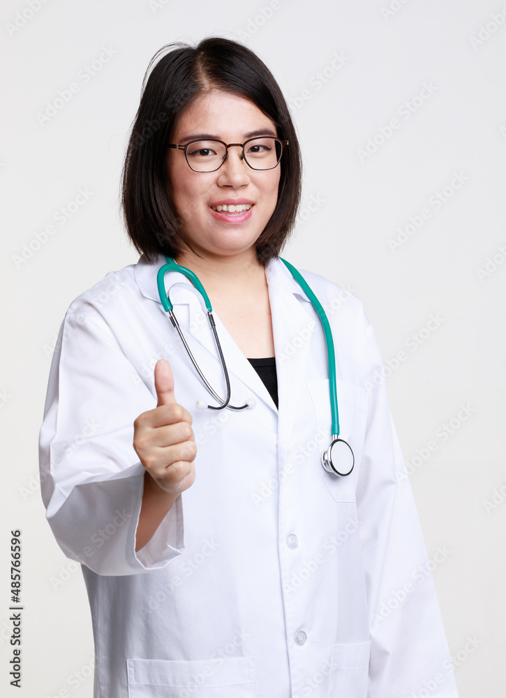 Portrait studio isolated cutout closeup shot of Asian professional successful female doctor in lab coat with stethoscope smiling look at camera on white background Portrait studio isolated cutout closeup shot of Asian professional successful female doctor in lab coat with stethoscope smiling look at camera on white background
