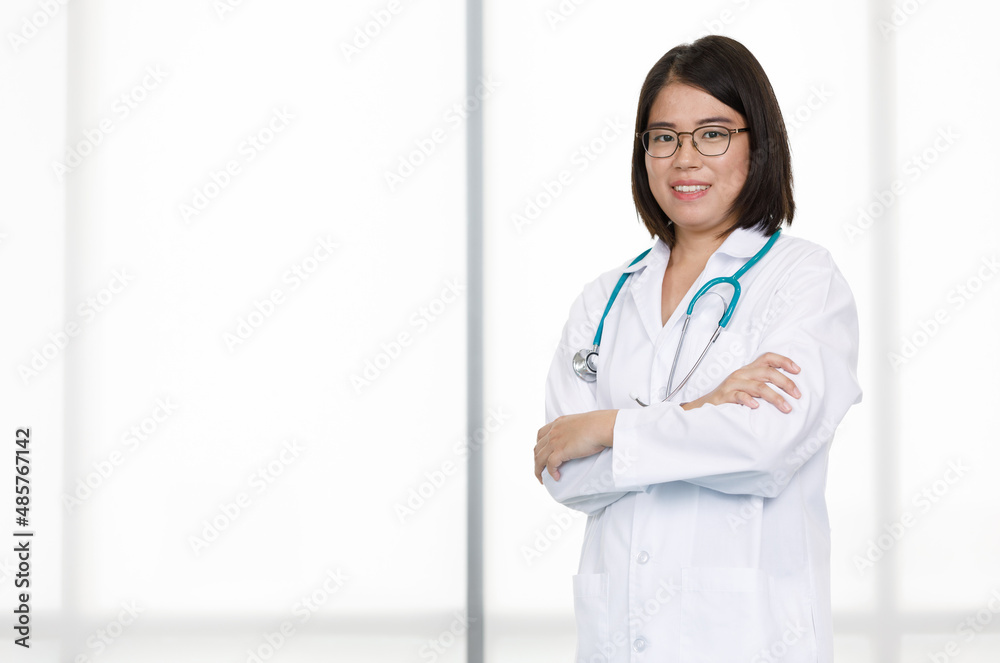 Portrait studio isolated cutout closeup shot of Asian professional successful female doctor in lab coat with stethoscope smiling look at camera on white background Portrait studio isolated cutout closeup shot of Asian professional successful female doctor in lab coat with stethoscope smiling look at camera on white background