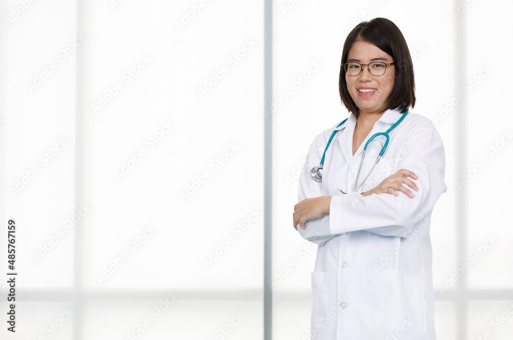 Portrait studio isolated cutout closeup shot of Asian professional successful female doctor in lab coat with stethoscope smiling look at camera on white background Portrait studio isolated cutout closeup shot of Asian professional successful female doctor in lab coat with stethoscope smiling look at camera on white background