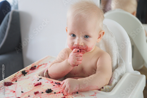 baby eating strawberries 
