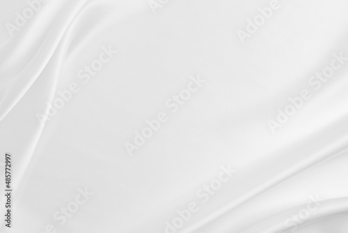 Elegance white satin silk with waves, abstract background luxury cloth, elegant wallpaper design. Abstract background luxury cloth or liquid wave