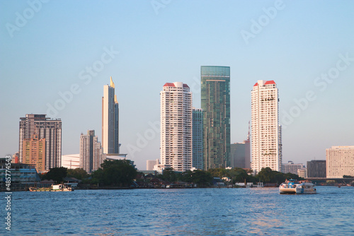 Tall buildings along the river in Thailand