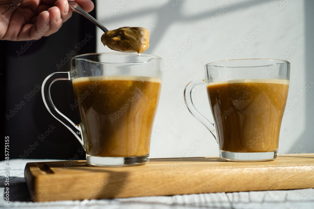 Dalgon coffee in beautiful glass cups with milk Dalgon coffee in beautiful glass cups with milk