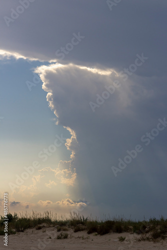 the rays of the sun break through the clouds