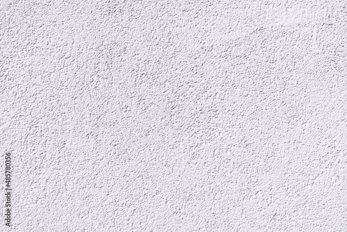 A white textured big grain wall background