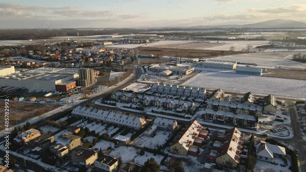 Modern industrial area with factory near residential district in european city, aerial view Modern industrial area with factory near residential district in european city, aerial view