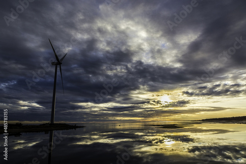 Windmill on the shore of Gulf of Bothnia photo