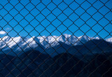 link fence and blue sky