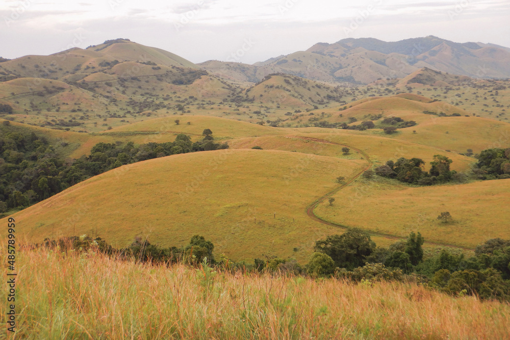 Scenic mountain landscapes against sky at Chyulu Hills, Chyulu Hills National Park, Kenya Scenic mountain landscapes against sky at Chyulu Hills, Chyulu Hills National Park, Kenya