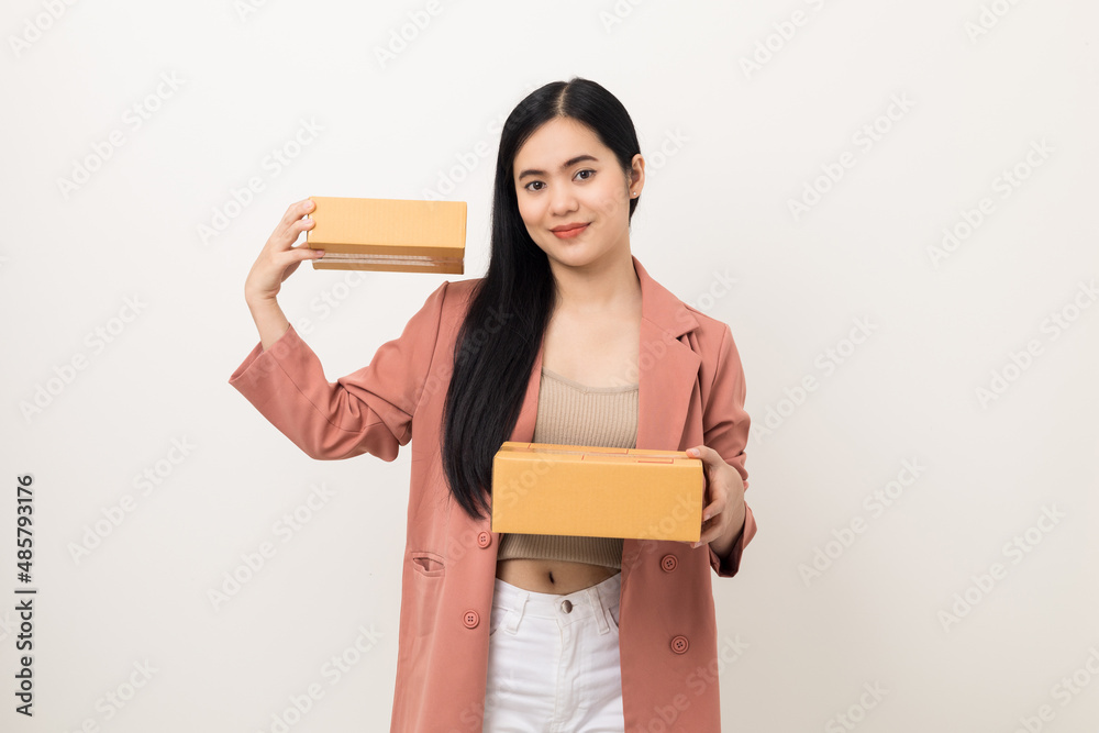 Young beautiful asian woman with many parcel cardboard standing on isolated white background. Delivery woman holding lot of parcel box sending to messenger. Young beautiful asian woman with many parcel cardboard standing on isolated white background. Delivery woman holding lot of parcel box sending to messenger.