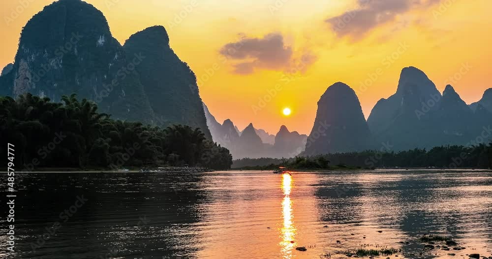 Beautiful mountain and river with sky clouds at sunrise in Guilin