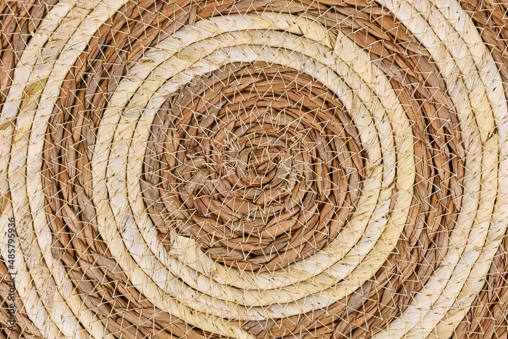 Naklejka premium Round weave wicker basket pattern background